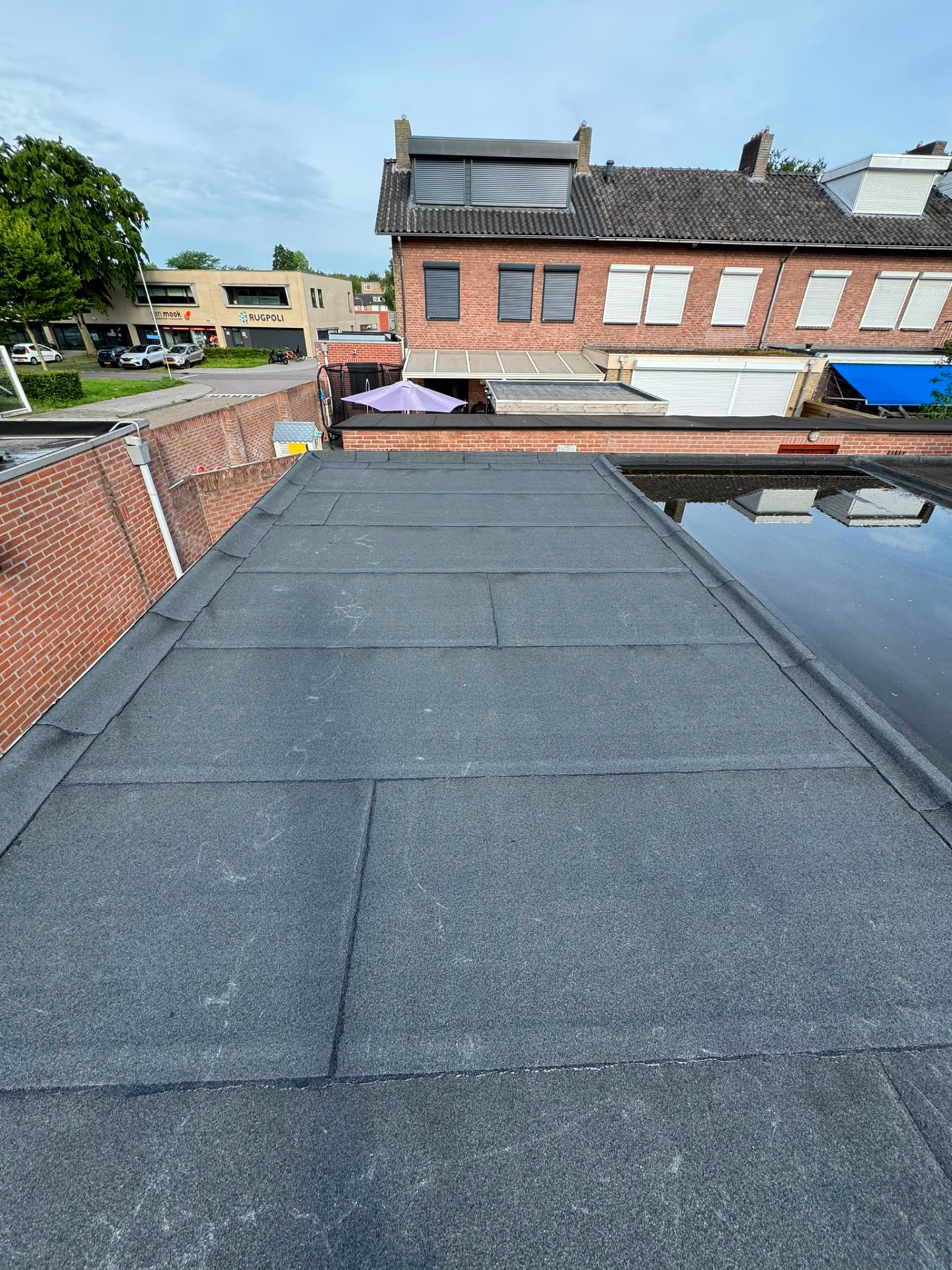 Plat dak met plassenvorming